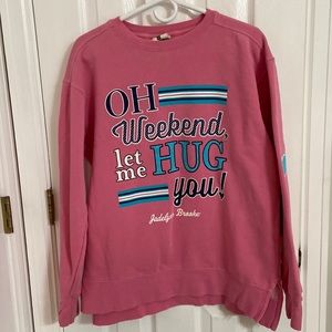 A pink sweatshirt. Excellent condition.